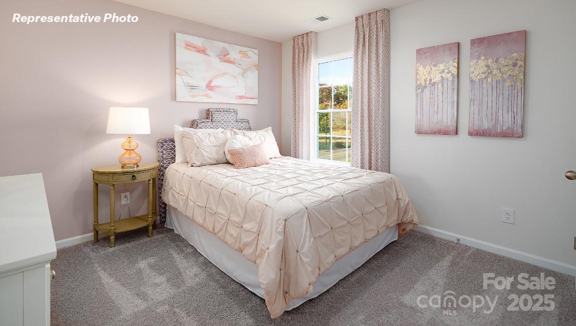 3844 Maxwell Henry Lane Northwest Conover, NC 28613 - Photo 23 of 30 a bedroom with a bed and painting on the wall