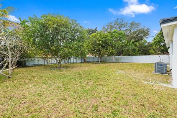 a view of an outdoor space and swimming pool