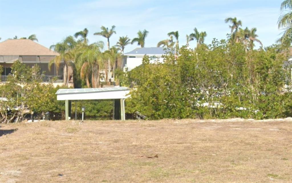 6508 Black Fin Way Apollo Beach, FL 33572 - Photo 7 of 19 a front view of a house with a yard