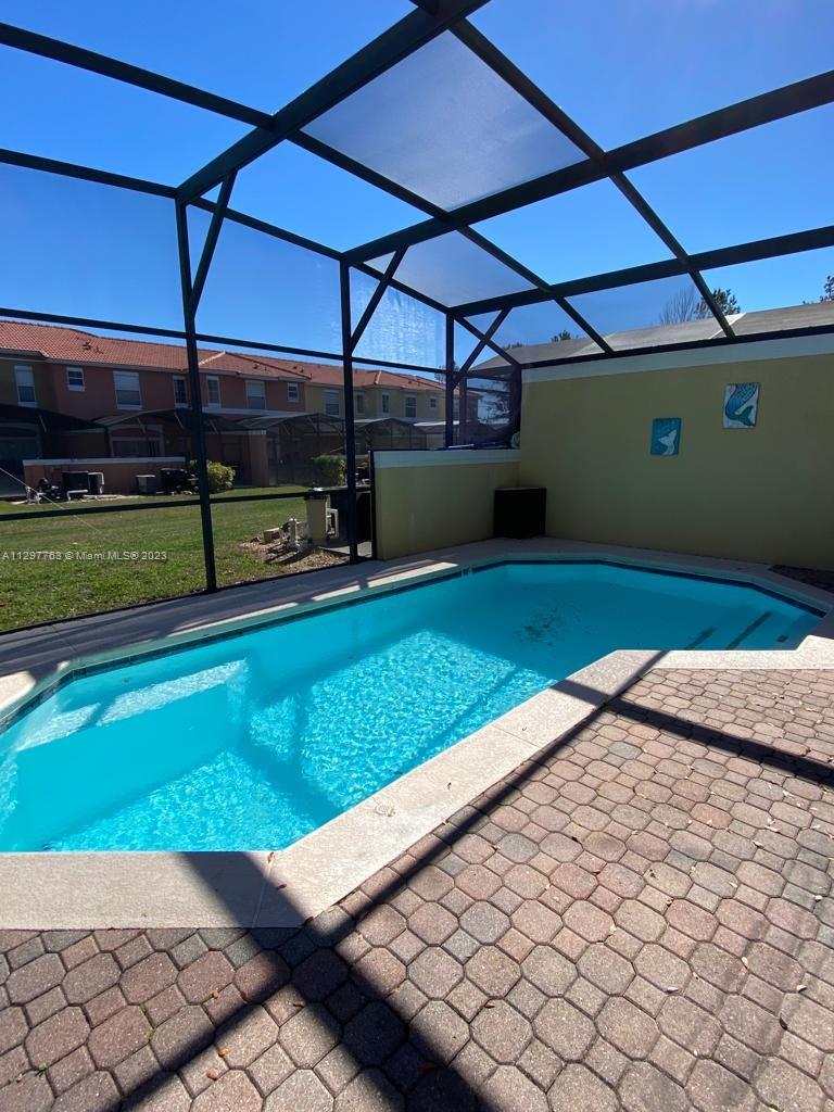 8570 Bay Lilly Loop Kissimmee, FL 34747 - Photo 25 of 36 a view of a backyard