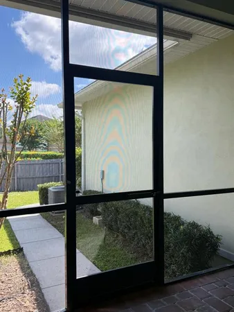 a view of swimming pool with a yard
