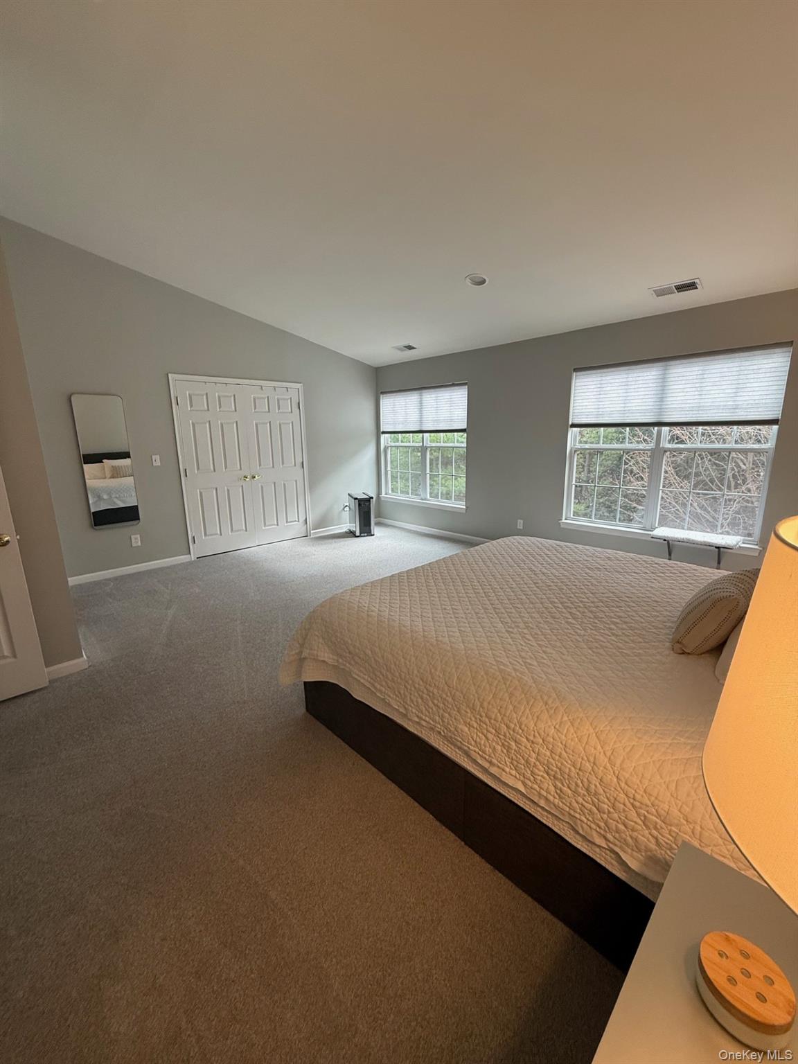 955 Huntington Drive Fishkill, NY 12524 - Photo 11 of 16 a bedroom with a bed and a large window