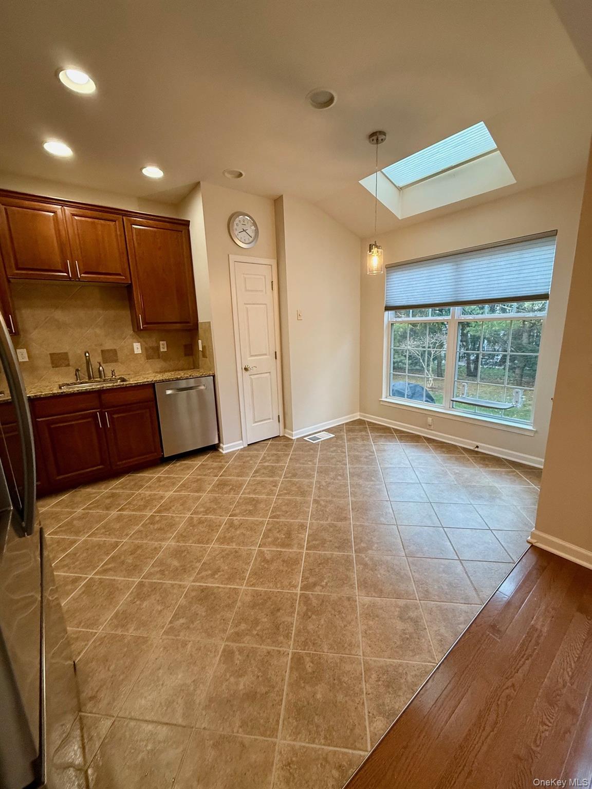 955 Huntington Drive Fishkill, NY 12524 - Photo 3 of 16 a large room with a large window and front door