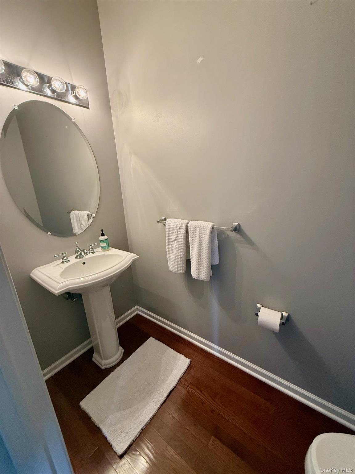 955 Huntington Drive Fishkill, NY 12524 - Photo 9 of 16 a bathroom with a sink and a mirror