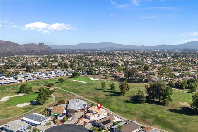 a view of a city with a lake