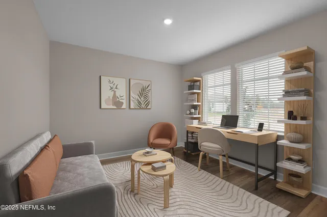 a workspace with furniture and a window