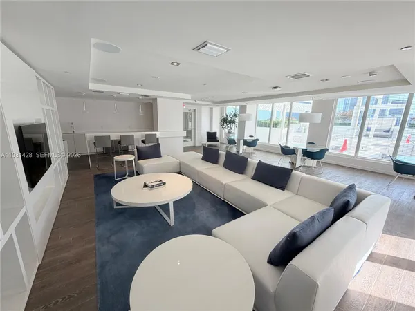 a view of a terrace with furniture