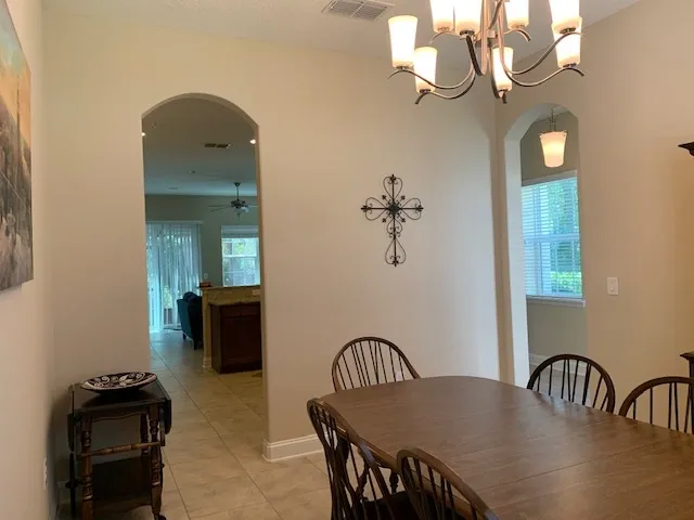 a view of a dining room with furniture