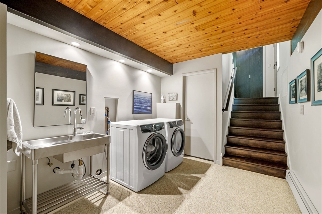 345 Cartwright Road Needham, MA 02492 - Photo 32 of 42 a utility room with dryer and washer