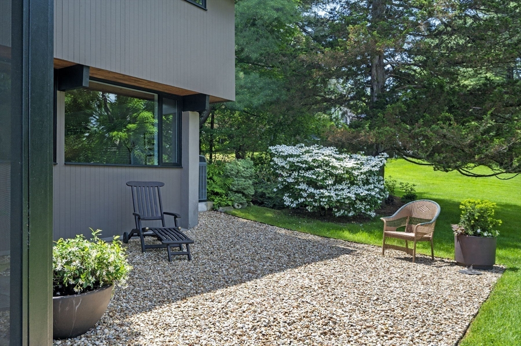 345 Cartwright Road Needham, MA 02492 - Photo 35 of 42 a garden view with a seating space