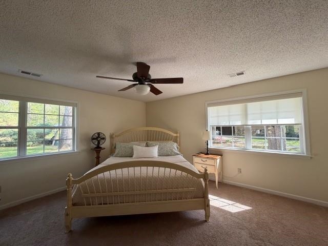11075 Highway 57 Moscow, TN 38057 - Photo 13 of 39 a bedroom with a bed dresser and a window