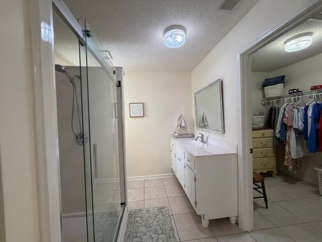 11075 Highway 57 Moscow, TN 38057 - Photo 16 of 39 a bathroom with a double vanity sink a mirror and shower