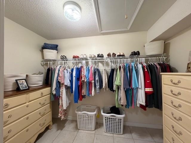 11075 Highway 57 Moscow, TN 38057 - Photo 20 of 39 a view of walk in closet with clothes