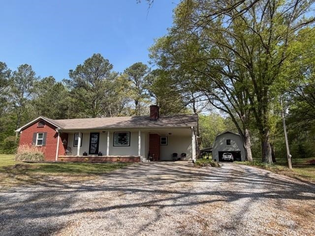 11075 Highway 57 Moscow, TN 38057 - Photo 2 of 39 a view of a house with a entertaining space
