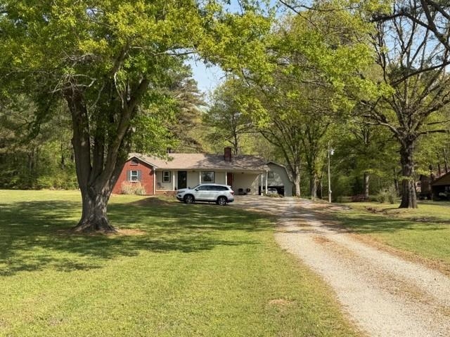 11075 Highway 57 Moscow, TN 38057 - Photo 3 of 39 a view of a house with pool and sitting area