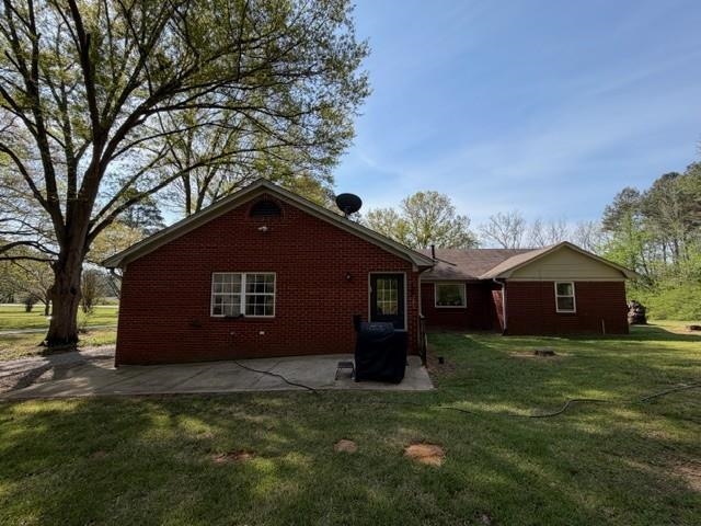 11075 Highway 57 Moscow, TN 38057 - Photo 31 of 39 a view of a house with a yard