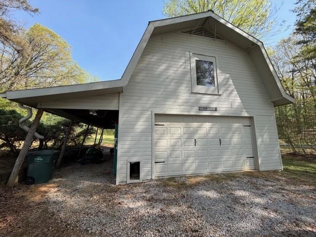 11075 Highway 57 Moscow, TN 38057 - Photo 33 of 39 a front view of a house with garage