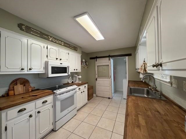 11075 Highway 57 Moscow, TN 38057 - Photo 8 of 39 a kitchen with granite countertop a sink stove and cabinets
