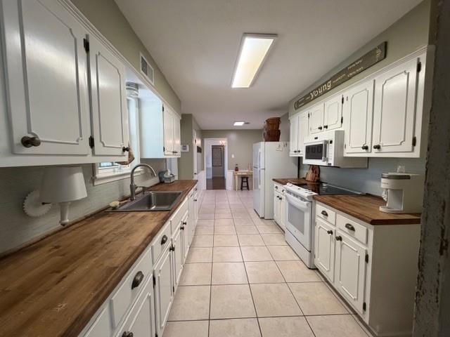 11075 Highway 57 Moscow, TN 38057 - Photo 9 of 39 a large kitchen with stainless steel appliances granite countertop a stove a sink and a granite counter tops