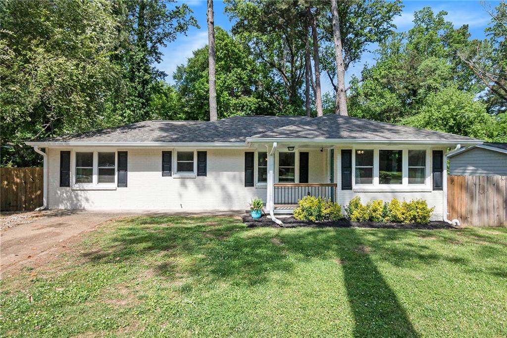 1783 Thomas Terrace Decatur, GA 30032 - Photo 1 of 1 a front view of a house with a yard