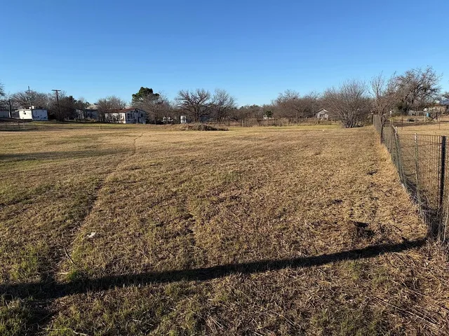 a view of a lake from a yard