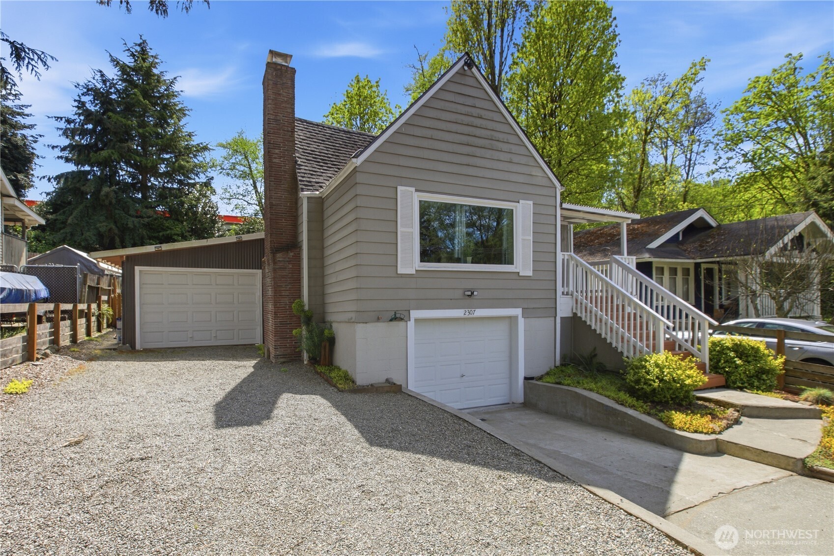 2307 Southwest Myrtle Street Seattle, WA 98106 - Photo 3 of 30 a view of a house with backyard