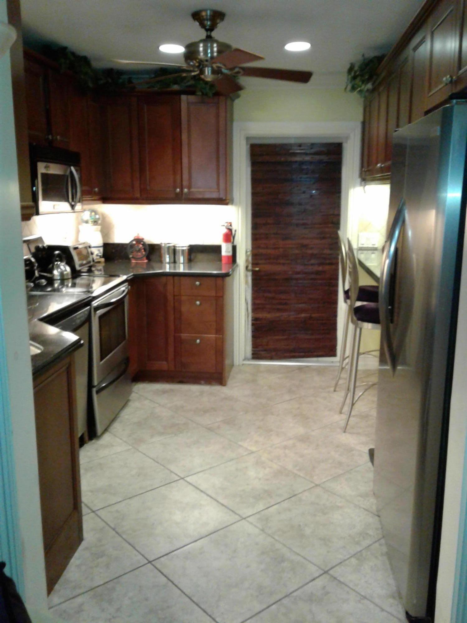 5422 Garfield Road Delray Beach, FL 33484 - Photo 2 of 18 18 inch Diamond laid Tile Throughout