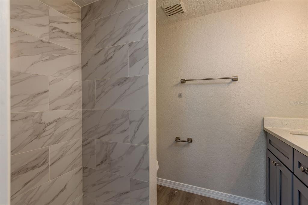 3538 Bluebell Lane Holiday, FL 34691 - Photo 15 of 25 a bathroom with a shower