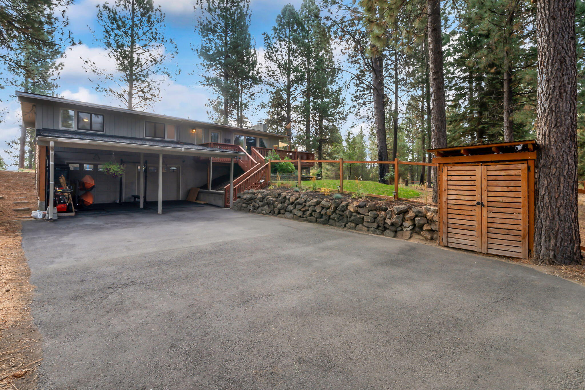 16879 Elsinore Road Bend, OR 97707 - Photo 36 of 48 front view of a house with a yard