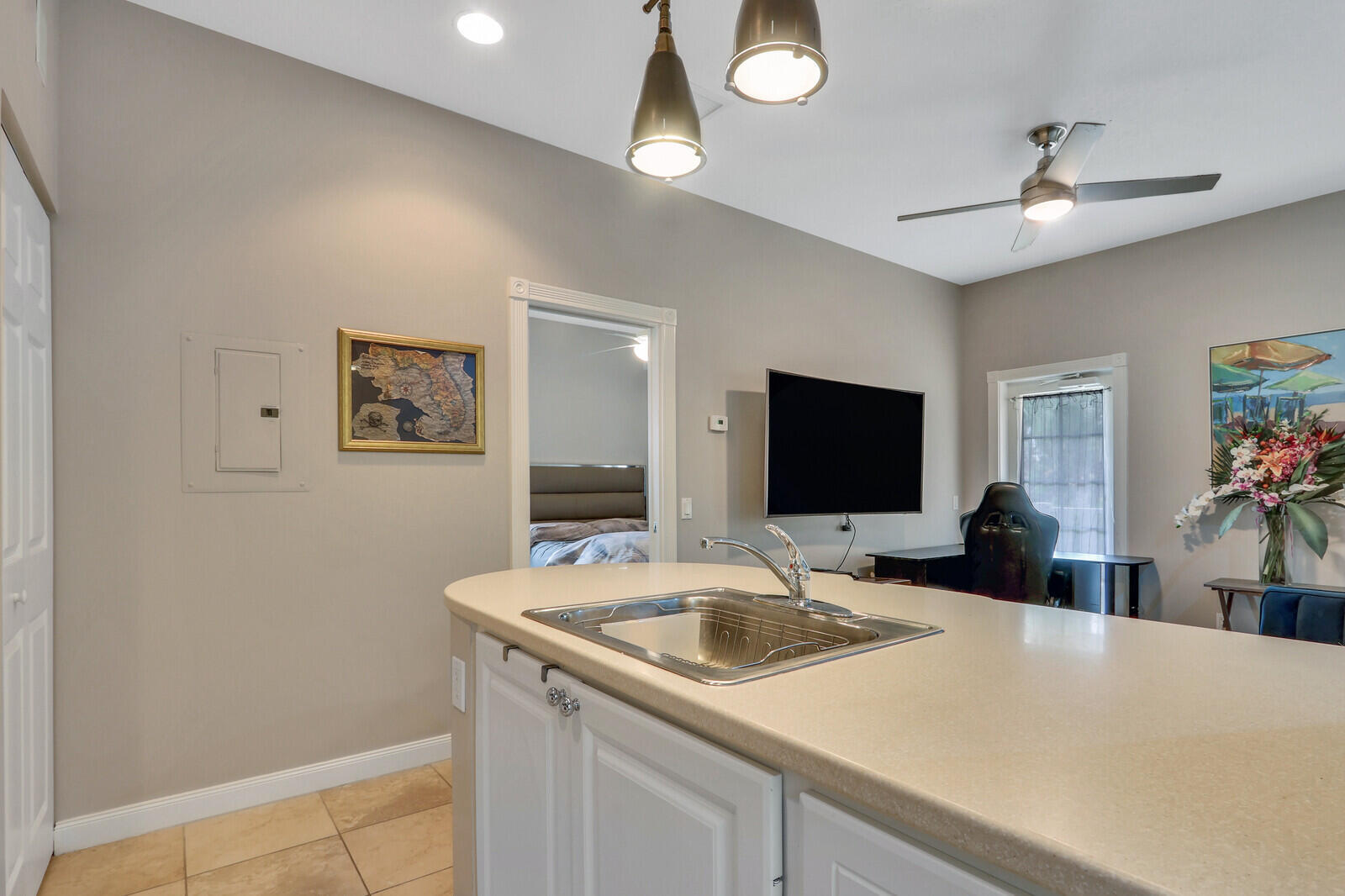 101 St Pierre Way Jupiter, FL 33458 - Photo 41 of 57 a kitchen with a sink and a refrigerator