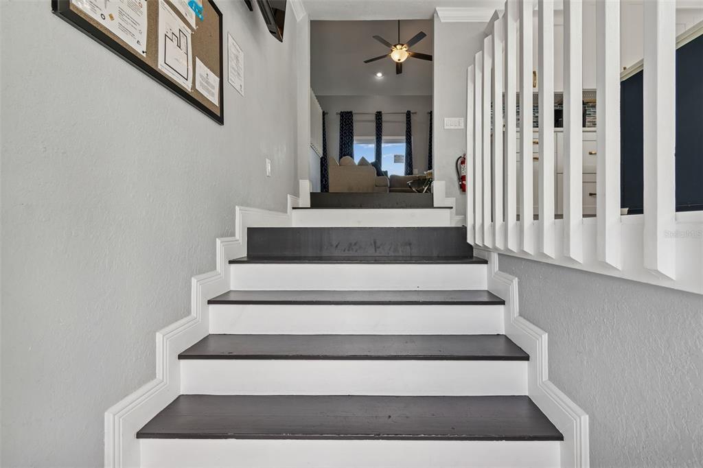 330 6th Avenue Indian Rocks Beach, FL 33785 - Photo 5 of 52 a view of entryway and hall with wooden floor