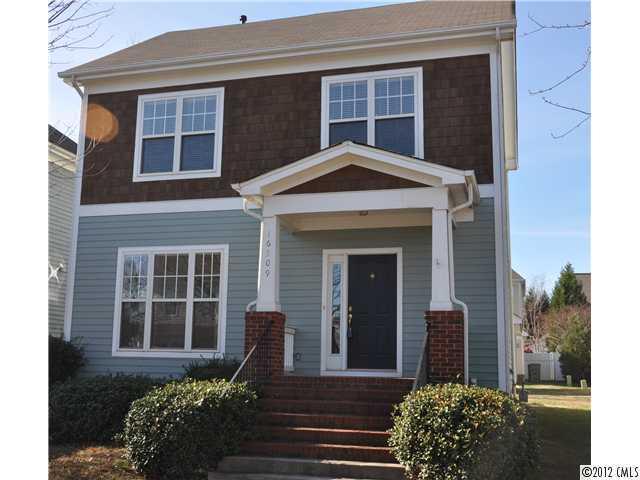 16509 Knox Run Road Huntersville, NC 28078 - Photo 1 of 16 a front view of a house with garden