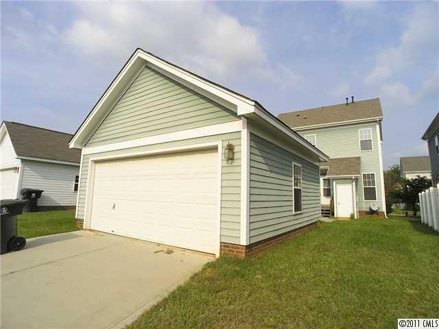 16509 Knox Run Road Huntersville, NC 28078 - Photo 16 of 16 a view of a house with a yard