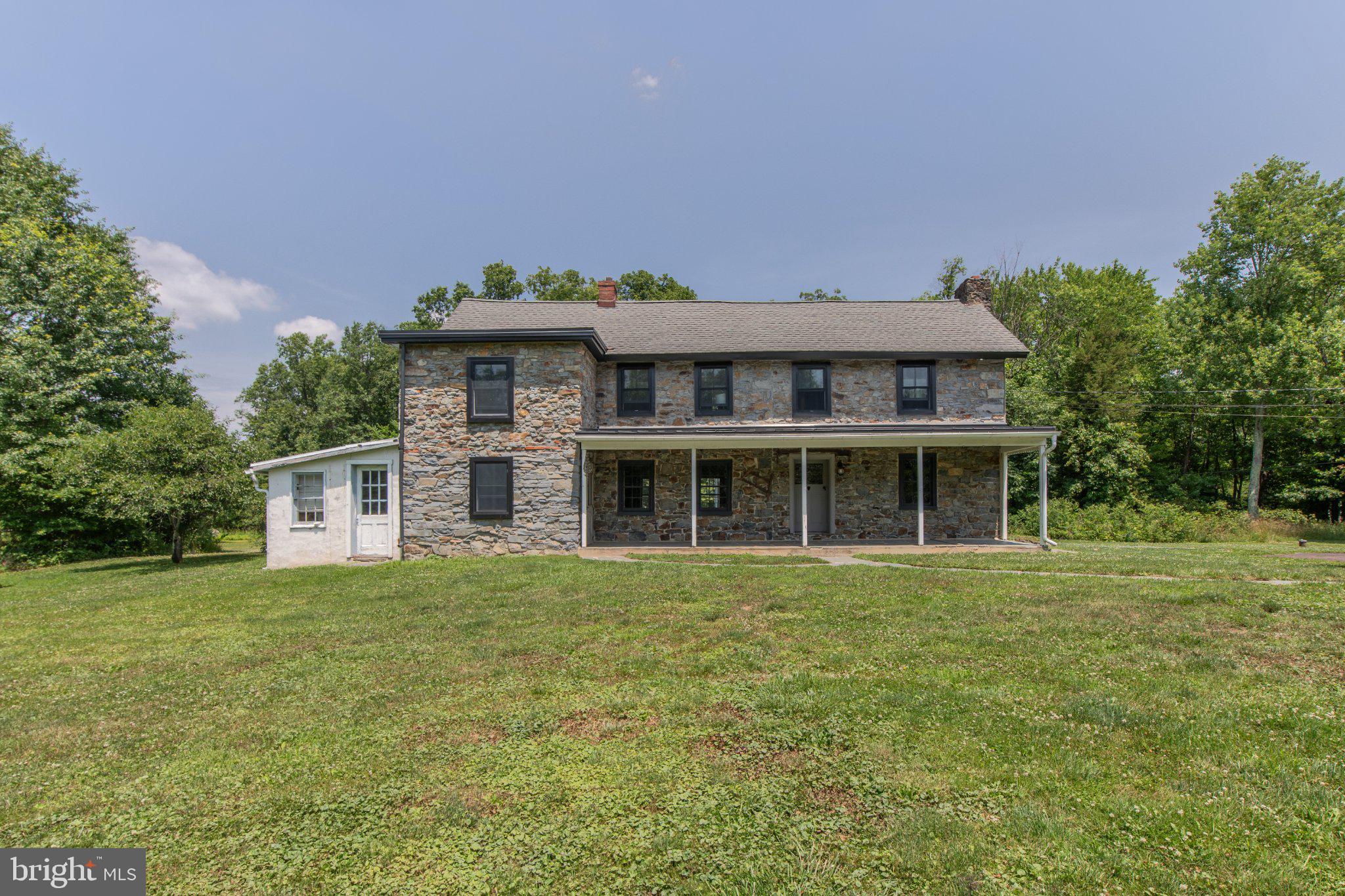 1350 Old Plains Road Pennsburg, PA 18073 - Photo 1 of 72 Charming stone farmhouse on lush grounds.