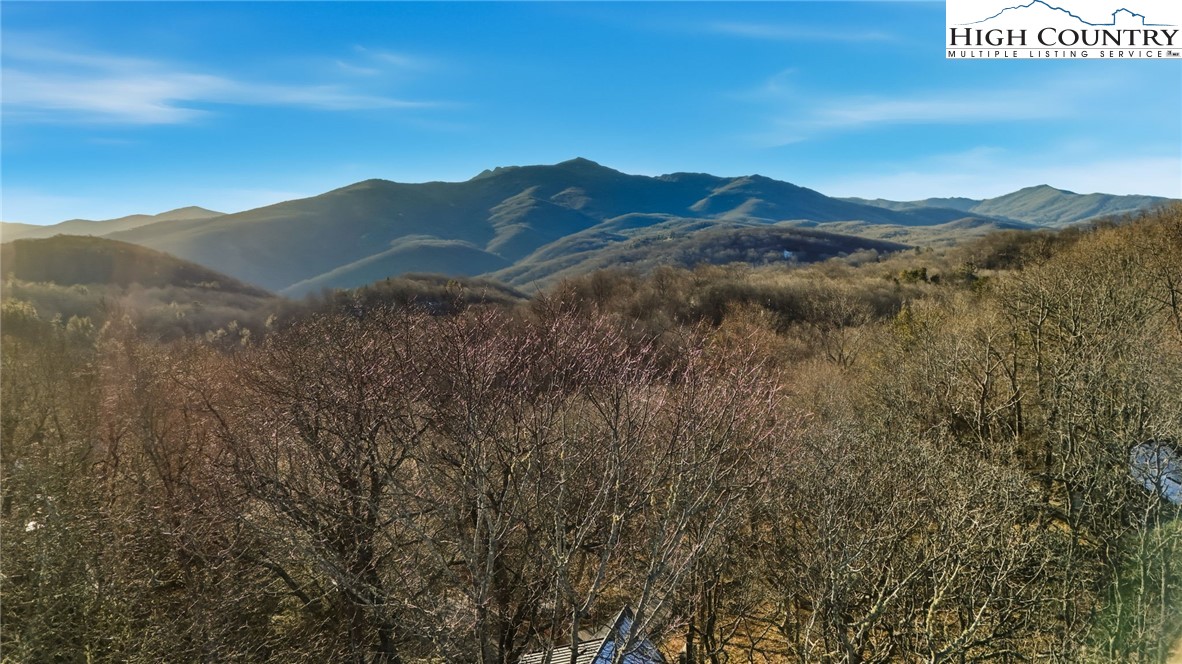 Lot #305 Misty Ridge Lane Blowing Rock, NC 28605 - Photo 21 of 22 a view of a town with mountains in the background