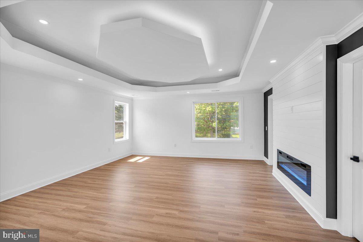 2504 Church Road Cinnaminson, NJ 08077 - Photo 28 of 79 an empty room with wooden floor and windows