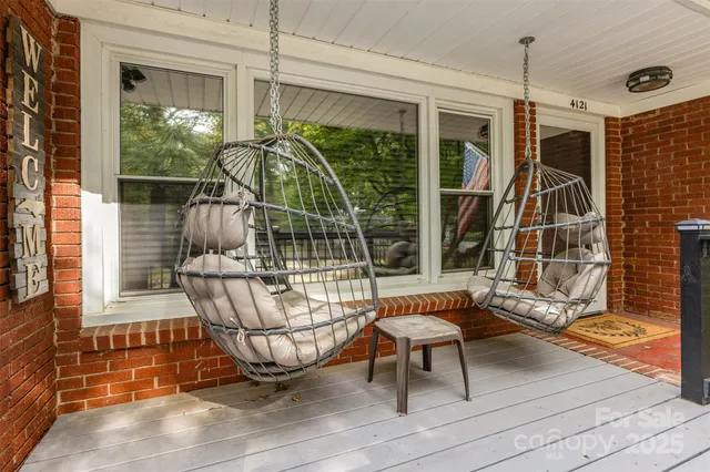 a view of a porch with furniture