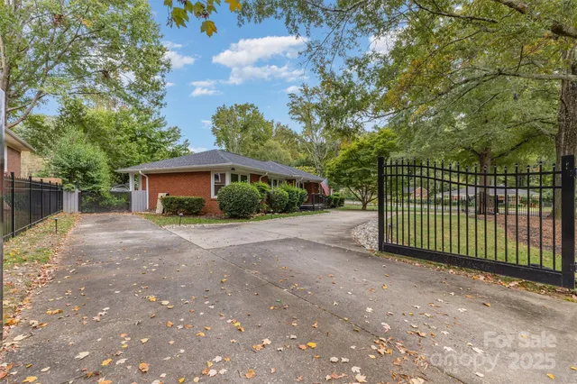 a view of a house with a street