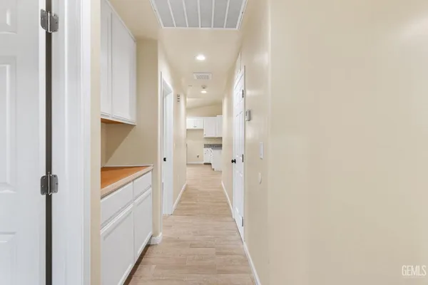 a view of a bathroom from the hallway