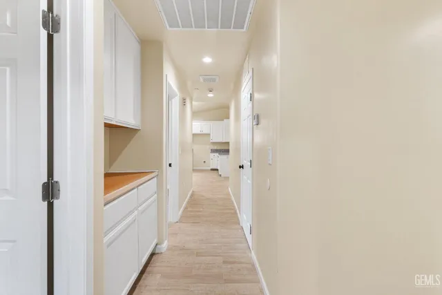 a view of a bathroom from the hallway