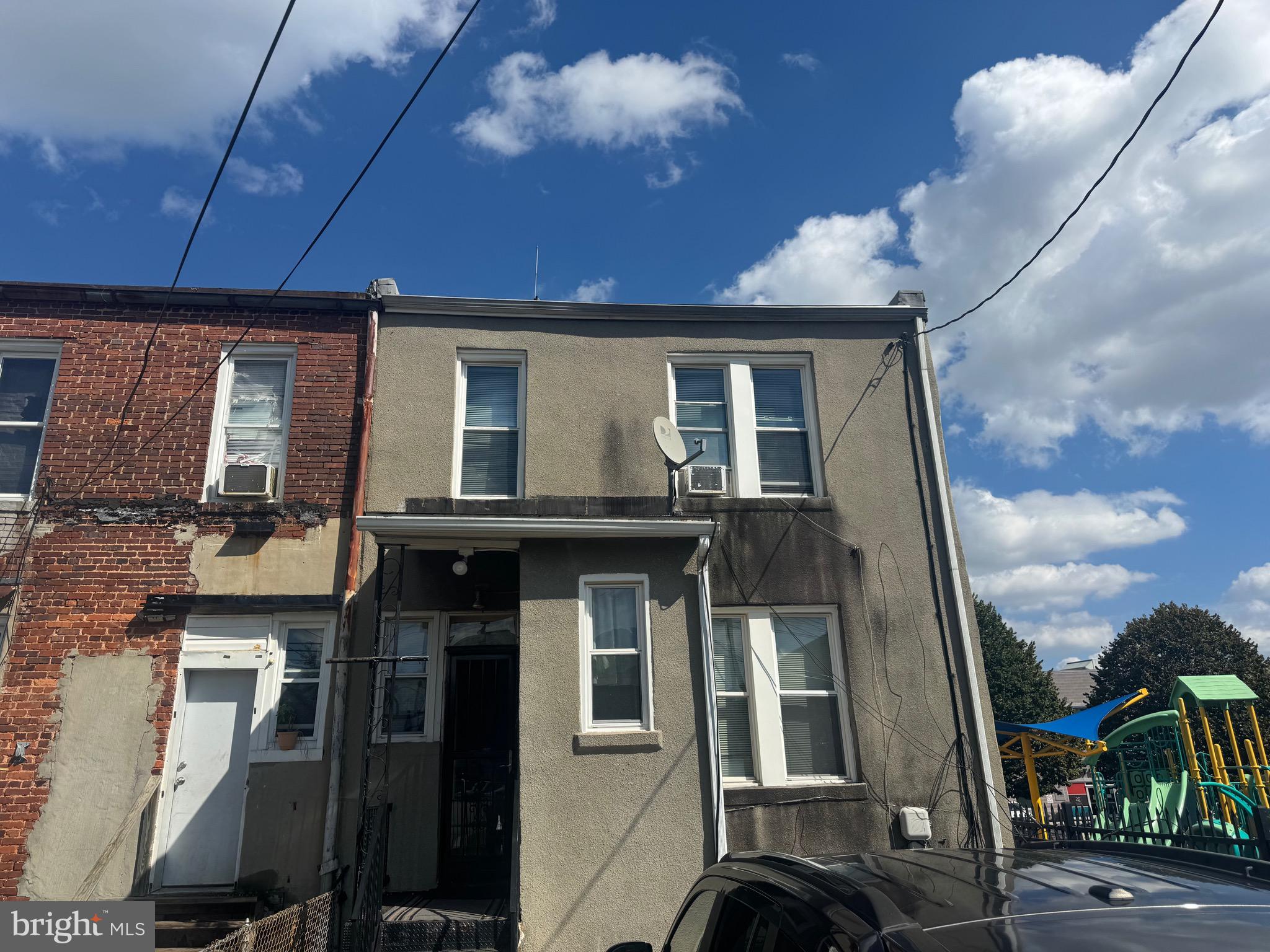 2214 North Monroe Street Baltimore, MD 21217 - Photo 19 of 19 a front view of a house with a yard