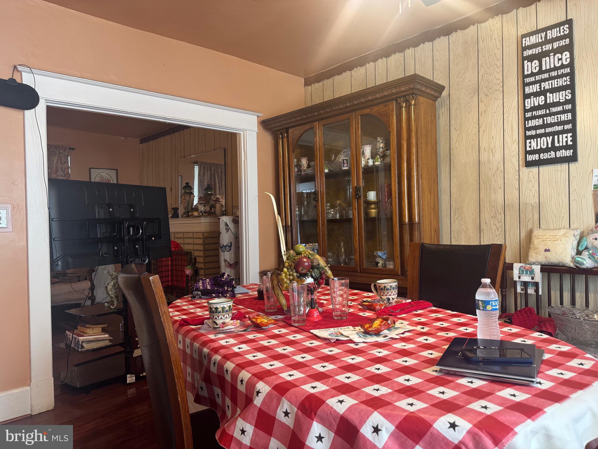 2214 North Monroe Street Baltimore, MD 21217 - Photo 8 of 19 a dining room with table and chairs