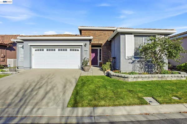 front view of house with a yard