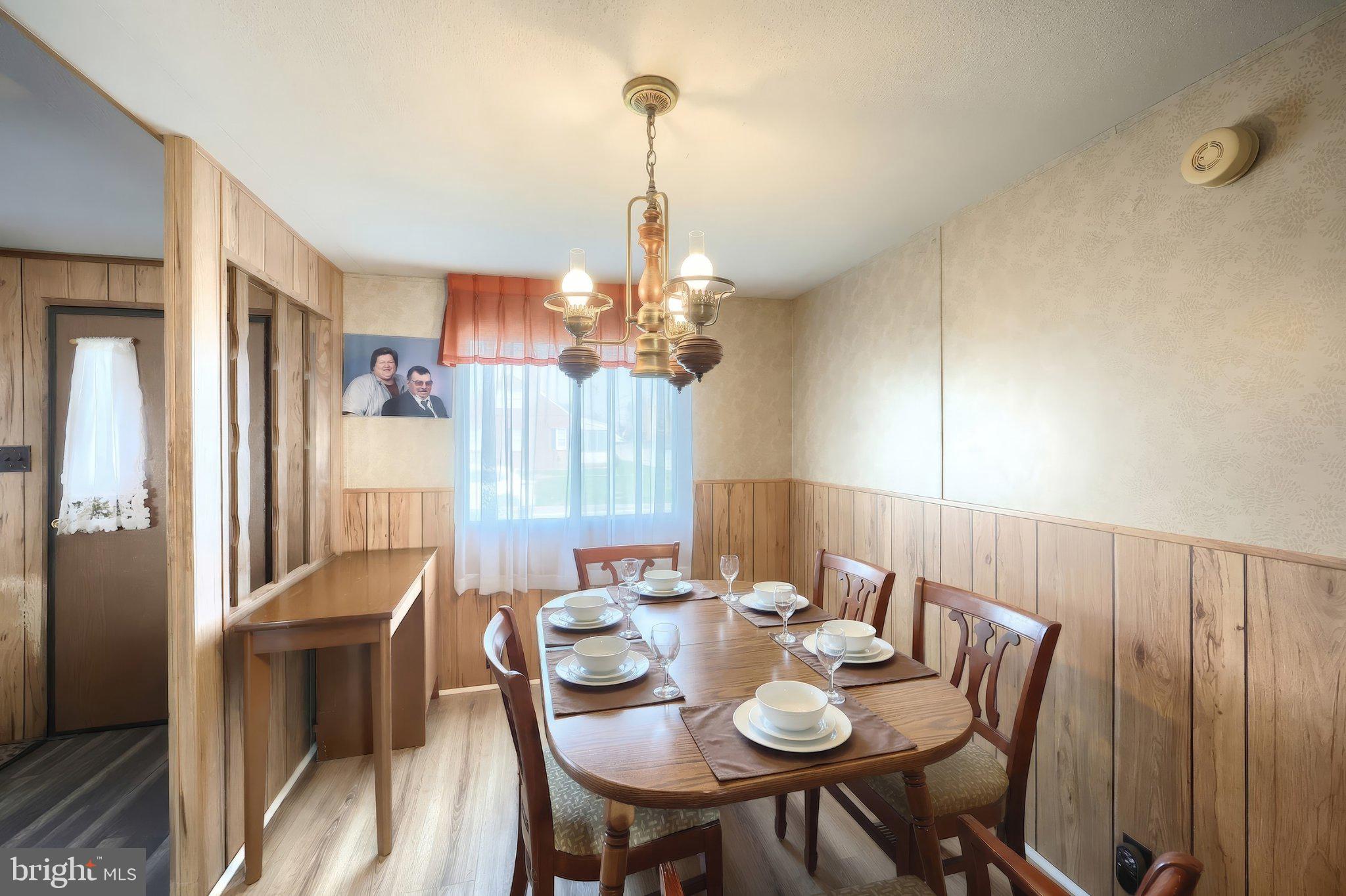 77 2nd Avenue Hanover, PA 17331 - Photo 13 of 22 a view of a dining room with furniture window and wooden floor