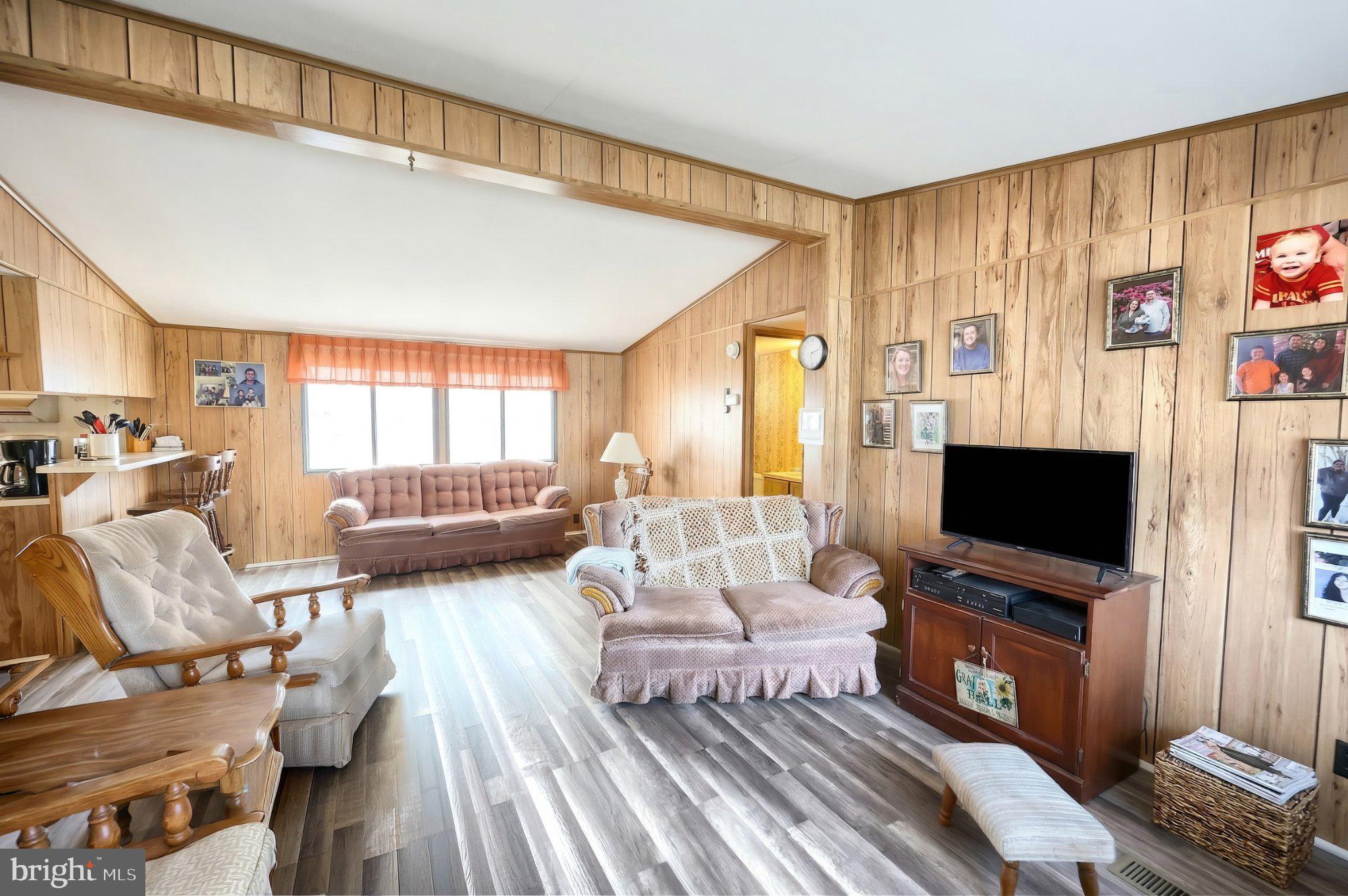 77 2nd Avenue Hanover, PA 17331 - Photo 17 of 22 a living room with furniture and a flat screen tv