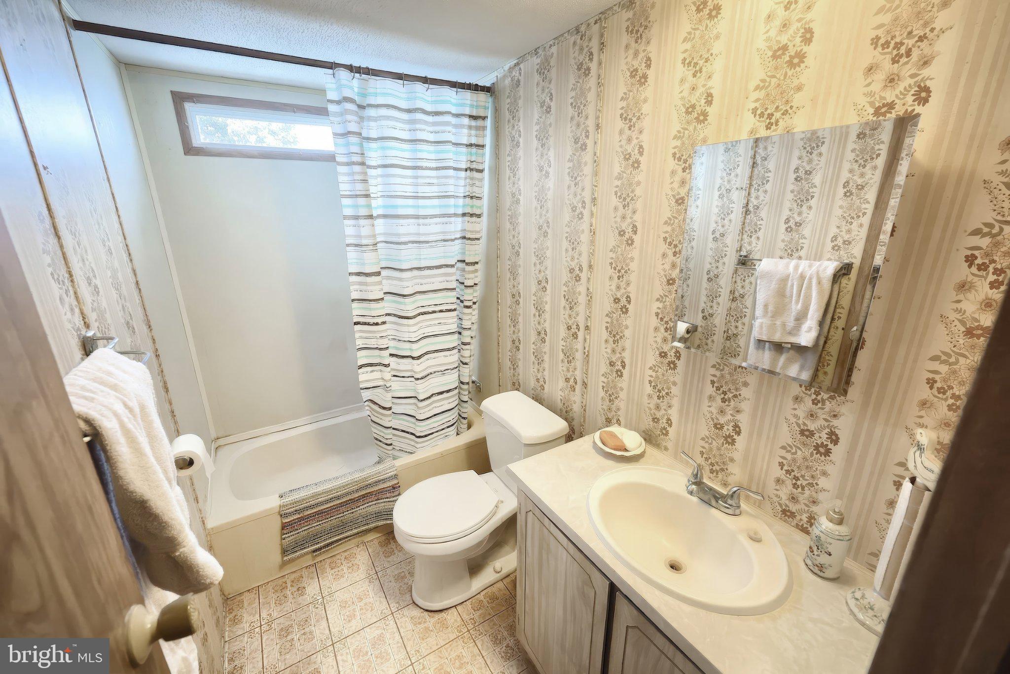 77 2nd Avenue Hanover, PA 17331 - Photo 19 of 22 a bathroom with a sink toilet and shower