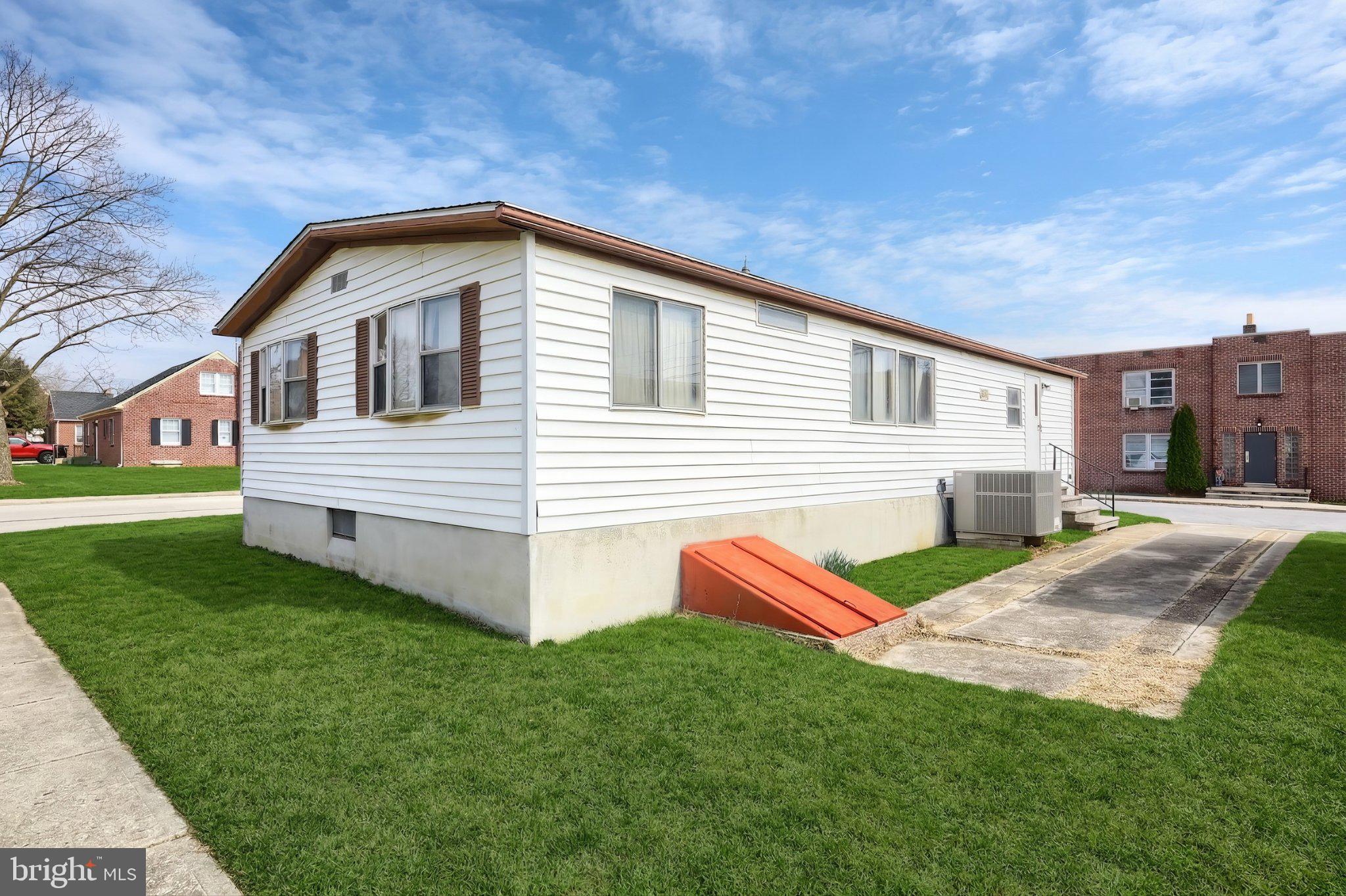 77 2nd Avenue Hanover, PA 17331 - Photo 7 of 22 a front view of a house with a yard