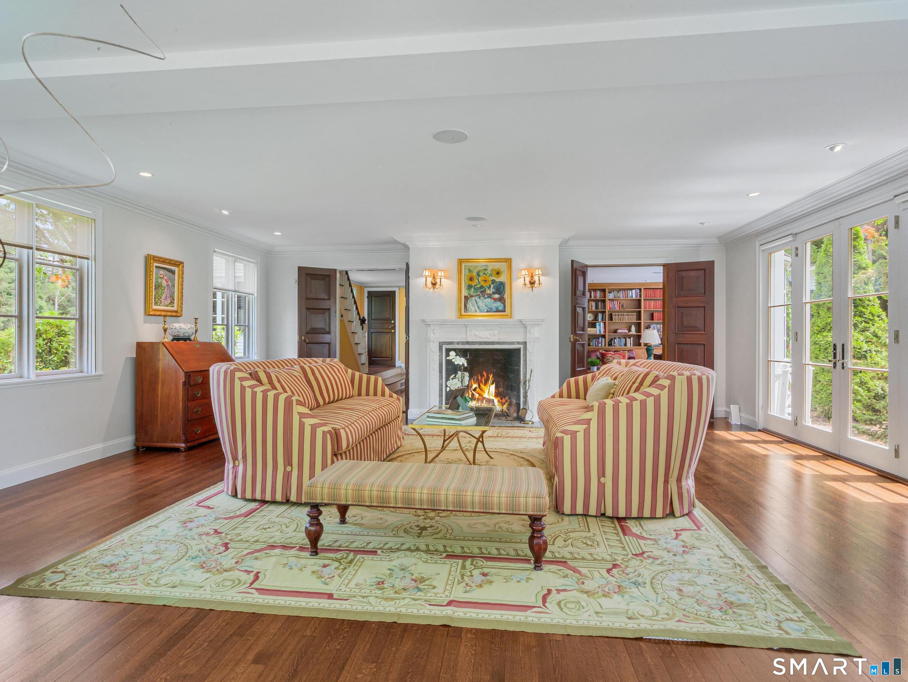 433 Wrights Crossing Road Pomfret Center, CT 06259 - Photo 8 of 40 Formal living room with a wood burning fireplace
