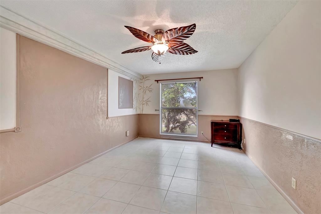 8380 Sands Point Boulevard, Unit J306 Tamarac, FL 33321 - Photo 21 of 33 a view of livingroom with furniture and ceiling fan