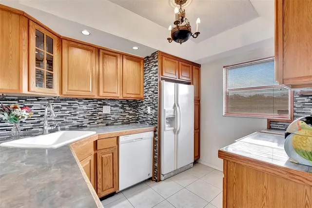 a workspace with furniture and a window